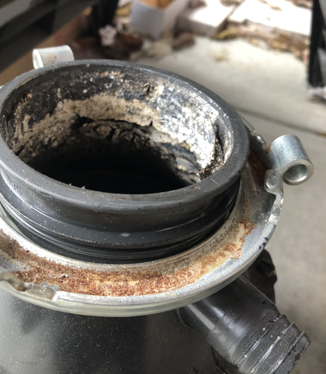 plumbing Why does my sink disposal come loose from the locking ring