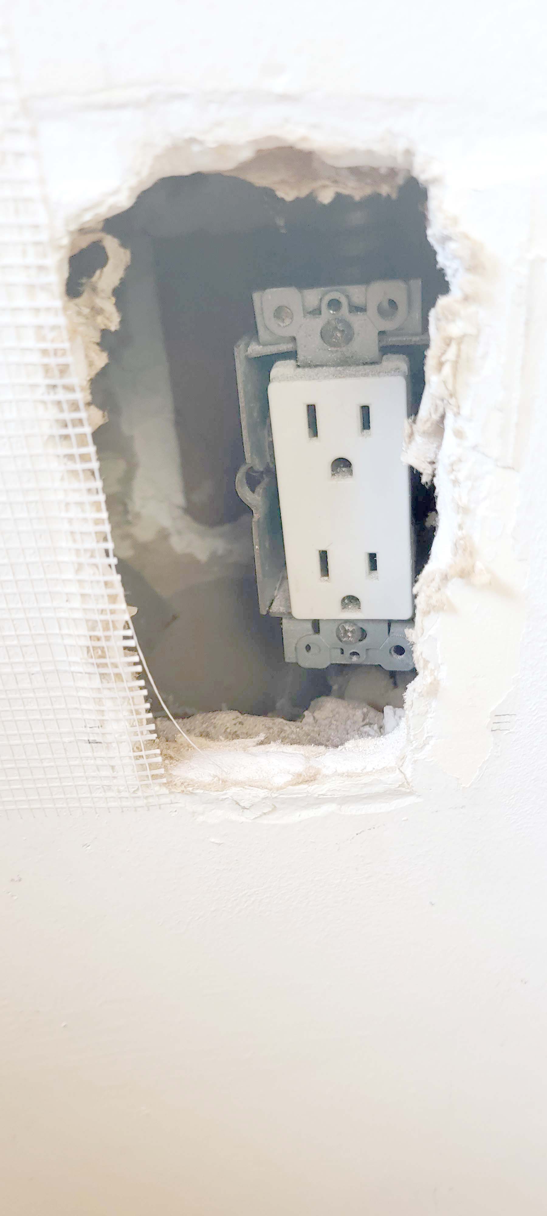 electrical How do I fix an outlet where the junction box falls into