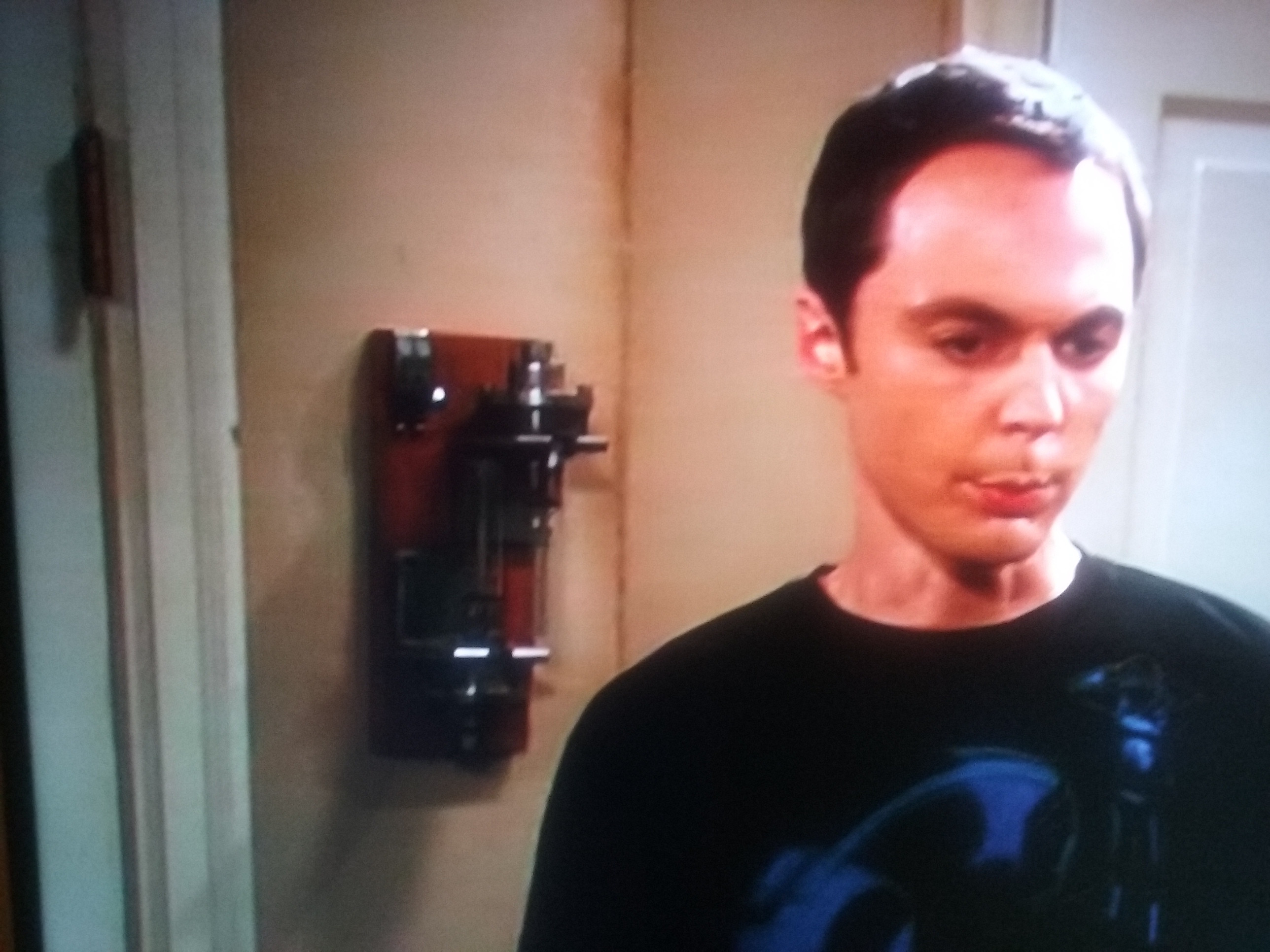the big bang theory What is in Sheldon's room on his wall? Movies