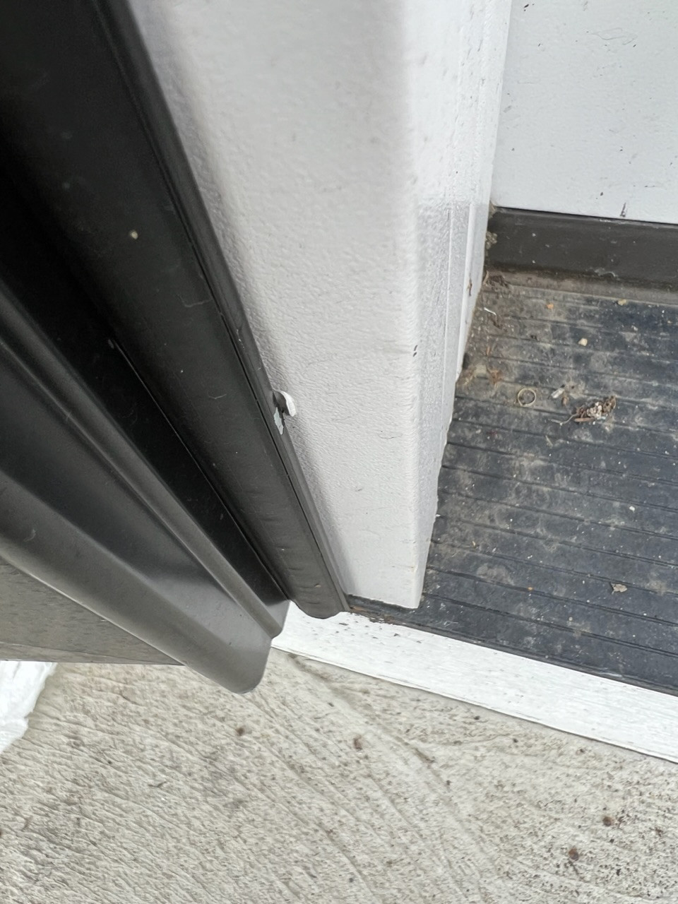 What's the best way to secure a flexing storm door jamb? Home Improvement Stack Exchange