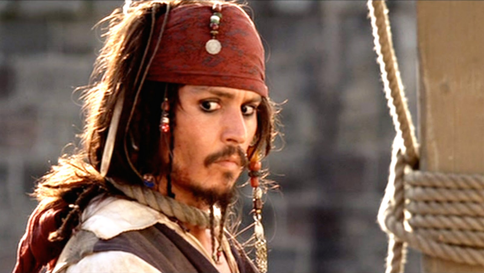 pirates of the caribbean When did Jack Sparrow get the cheek/jaw scar