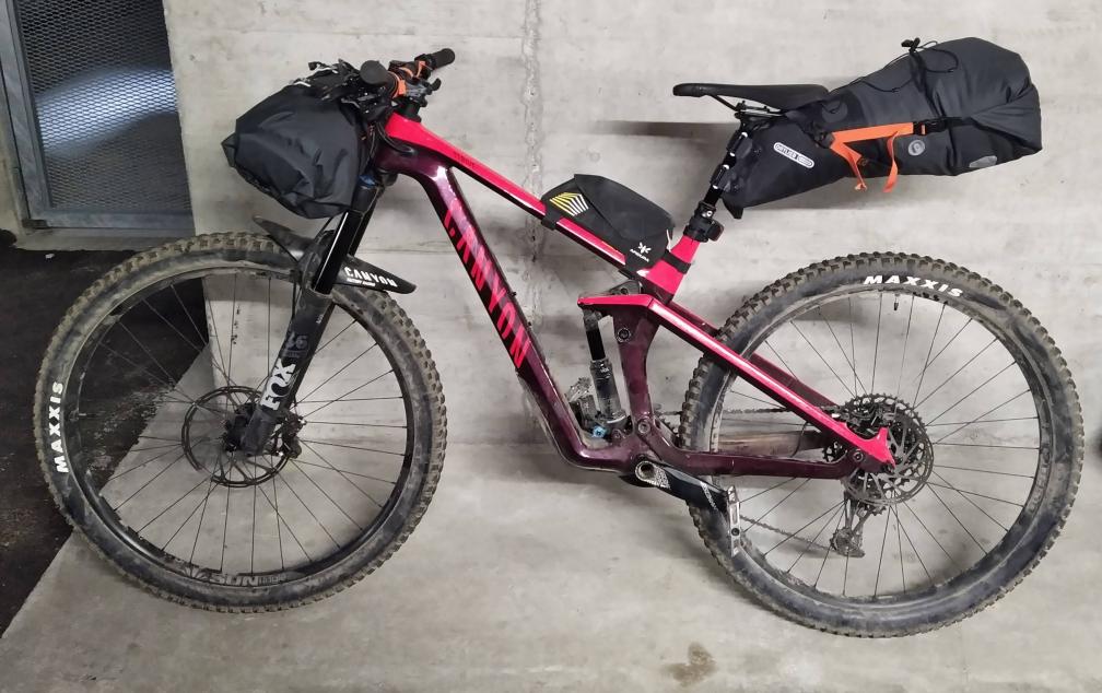 downhill Bickepacking saddle bag touches rear wheel on mountain bike
