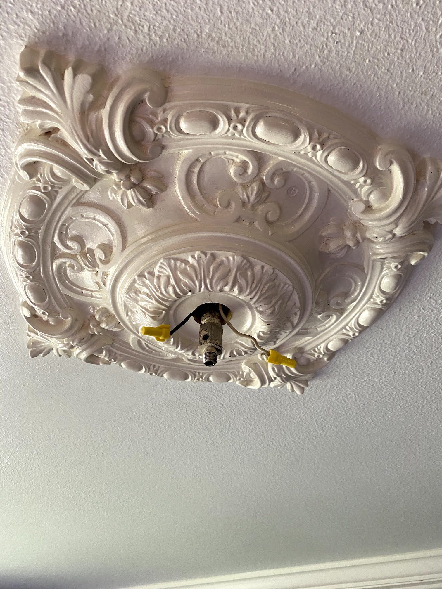 lighting Replace dated light fixture mounted to metal stem in ceiling