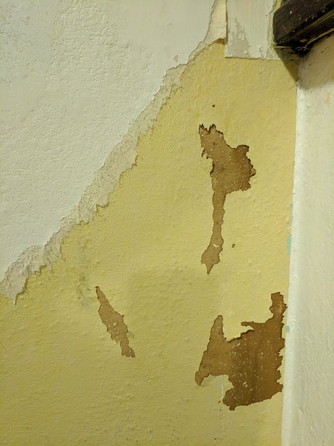 painting What do you think this odd layer under wall paper may be