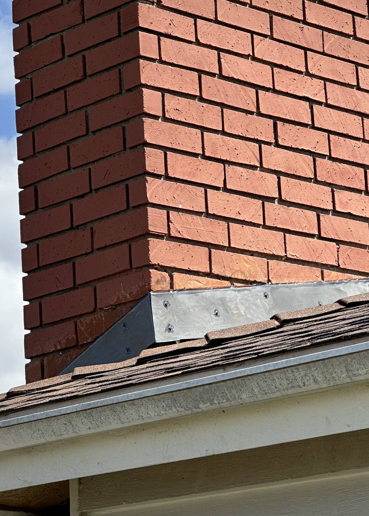 painting How to paint brick and galvanized flashing together? Home