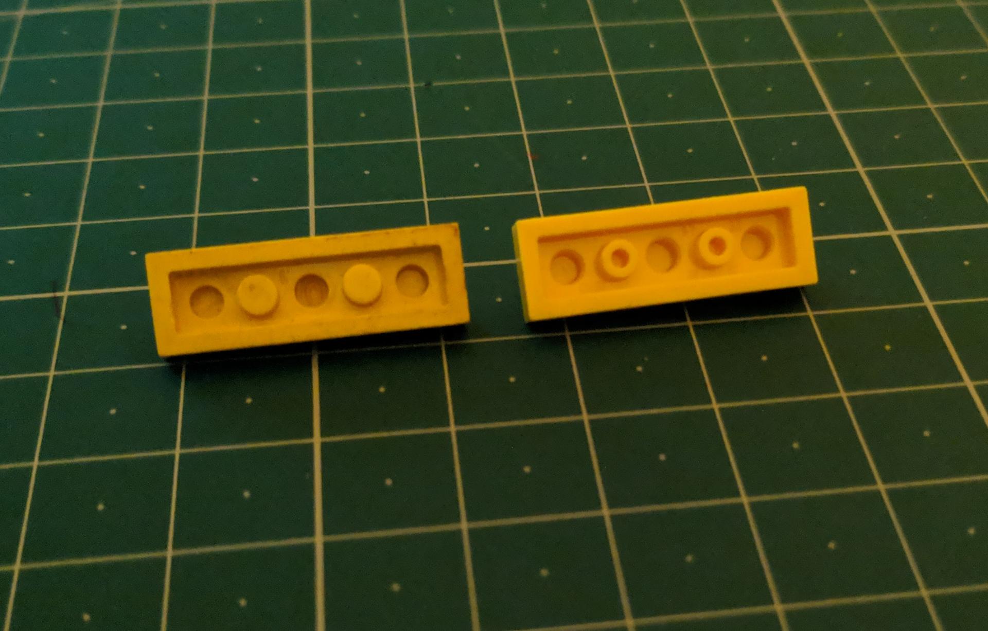 history Lego with hollow posts underneath dates? Bricks