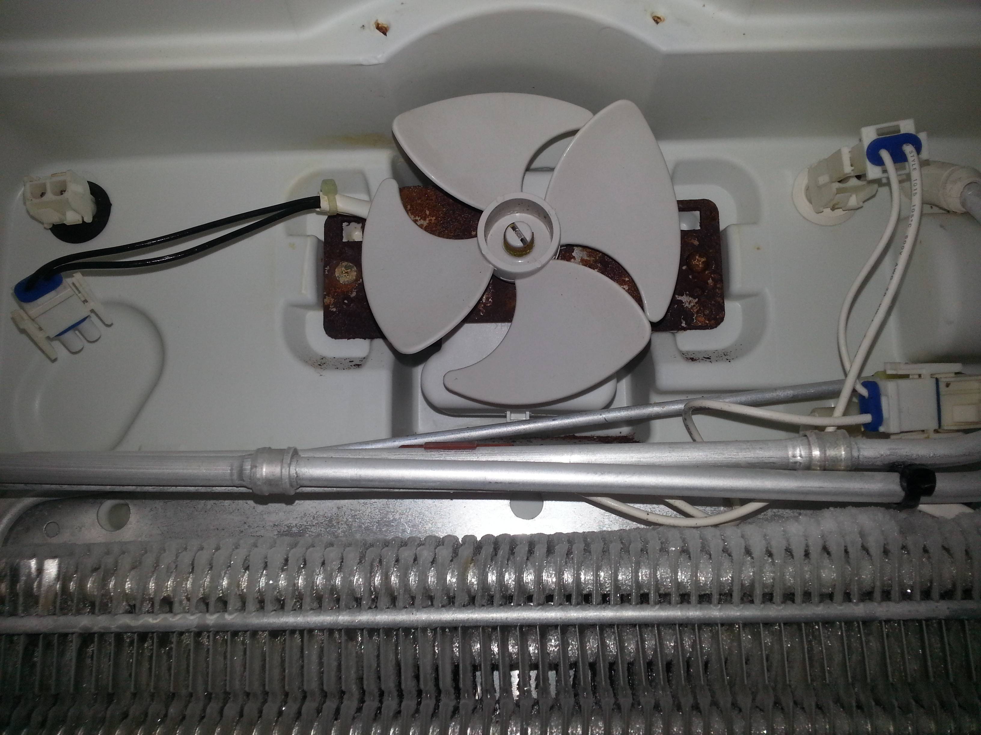 refrigerator What is this metal part around the fan's motor in my