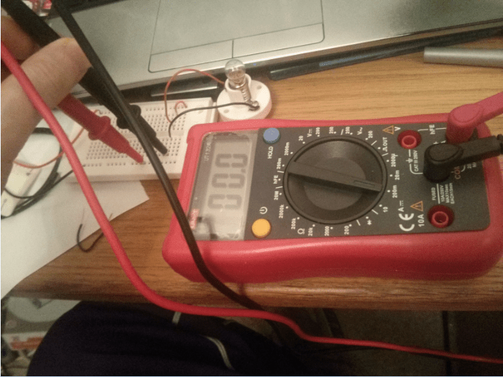 Why won't this bulb light when I put the multimeter in series