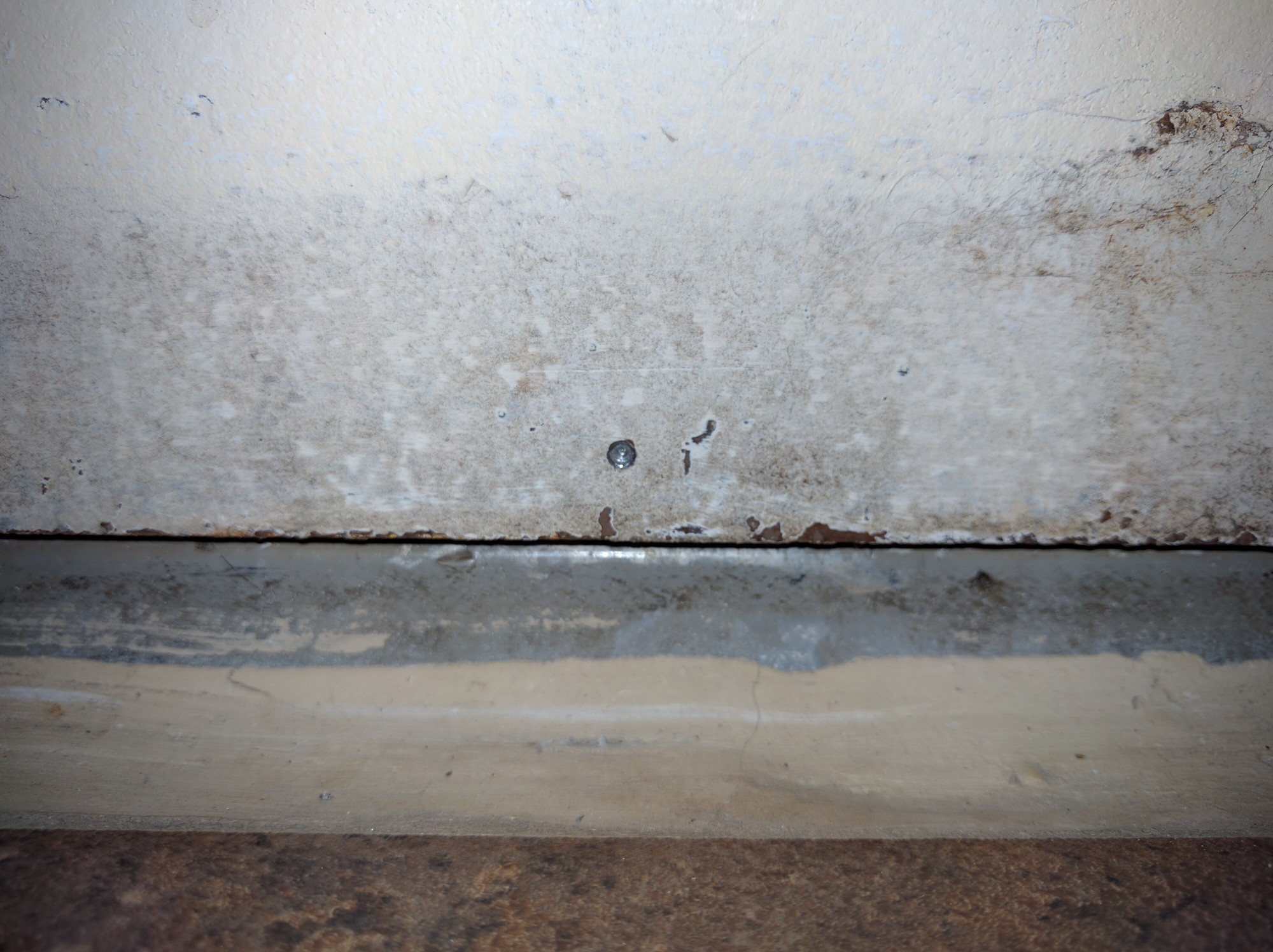 Doors – Door sweep install, why can’t I make a hole in the metal door