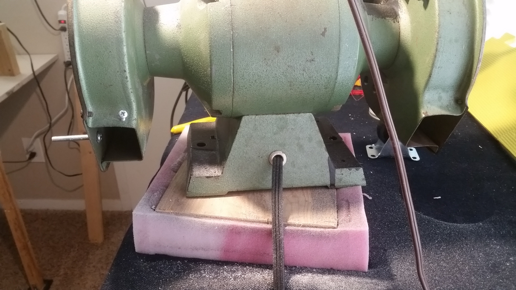 Something to catch exhaust particles made by bench grinder Home