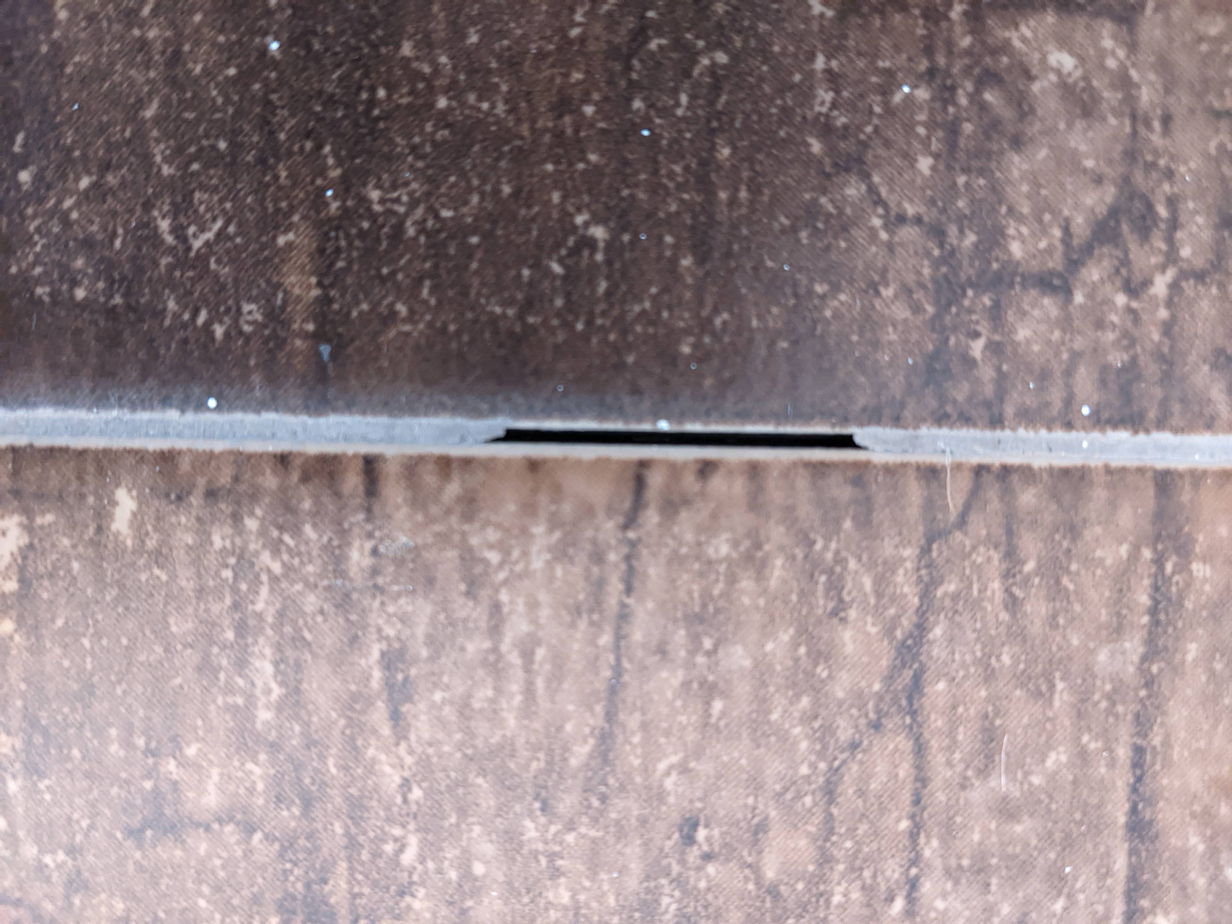 waterproofing Cracks and holes in tile floor grout. How urgent is