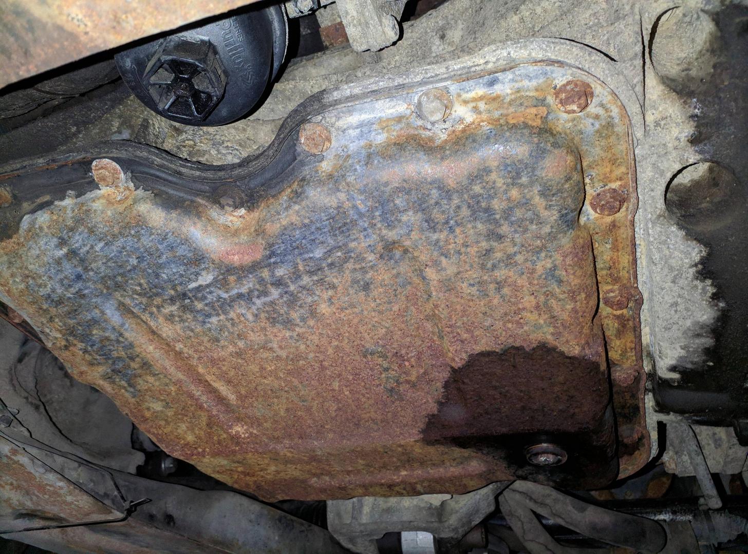 Nissan - Rusty Oil Pan, Clean Or Replace - Motor Vehicle Maintenance & Repair Stack Exchange