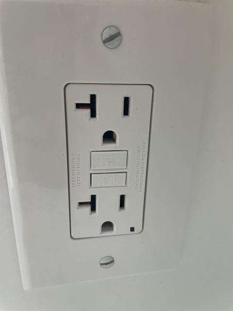 wiring - Oddly wired GFCI plug in my house - is this correct? - Home