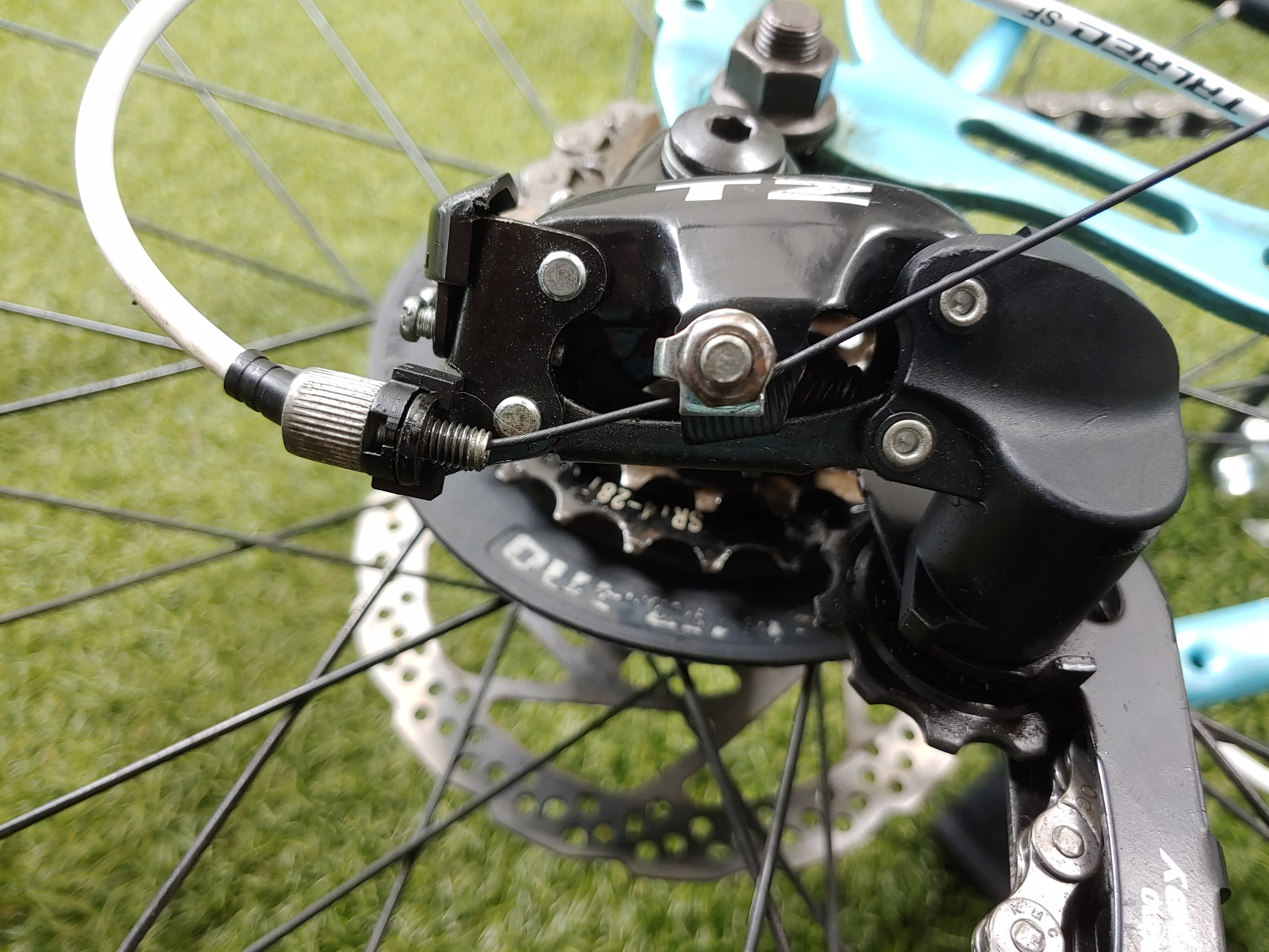 [SOLVED] Shimano TZ rear derailleur cable entry at strange angle