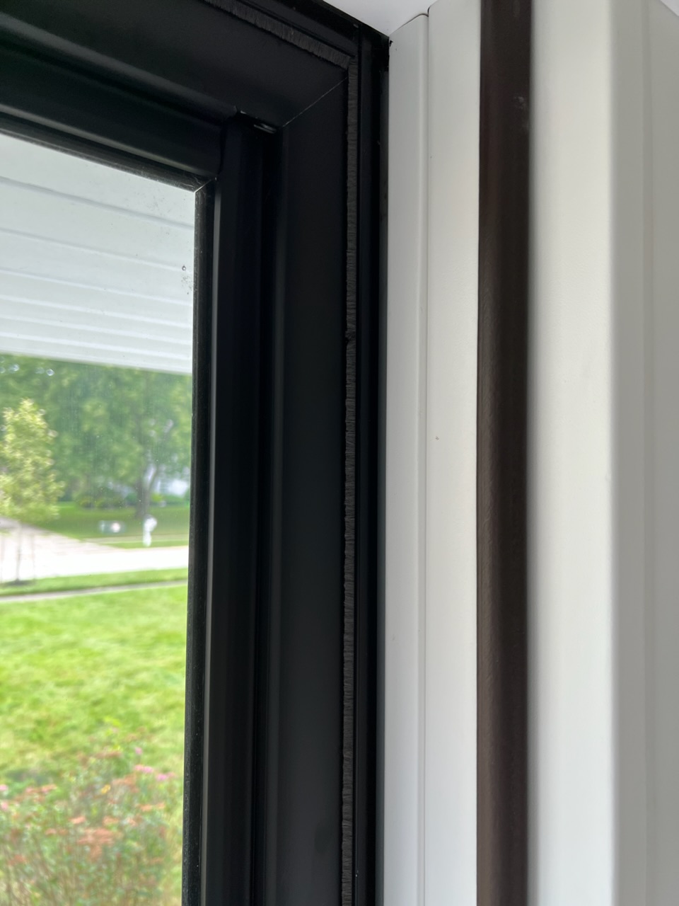 What's the best way to secure a flexing storm door jamb? Home Improvement Stack Exchange