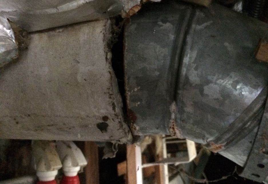 How to best connect this metal gas flue pipe to the old asbestos cement