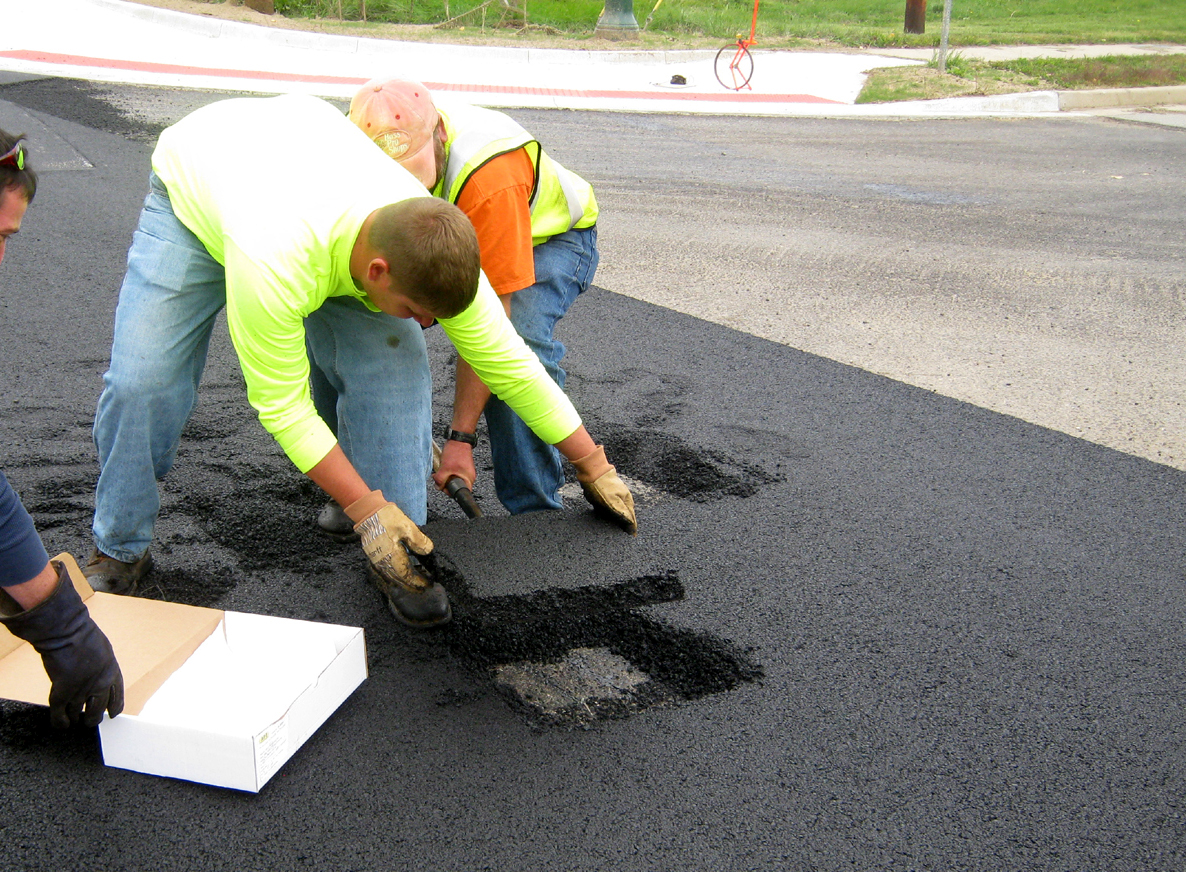 ASPHALT TESTING: Testing in progress Roads and Bridges