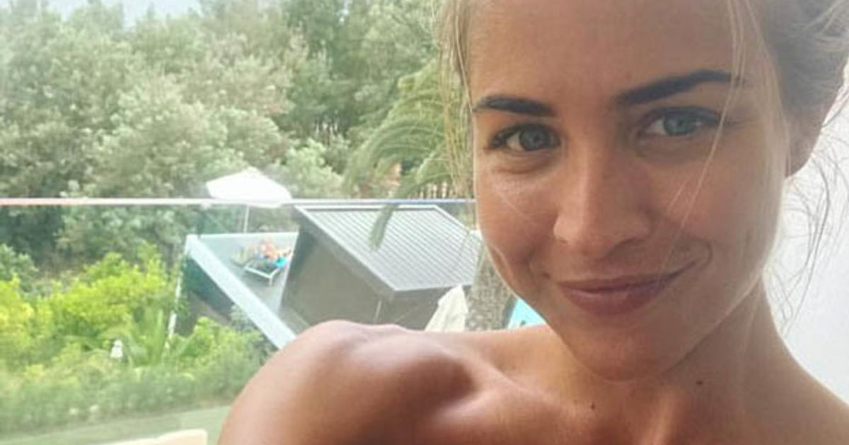 Gemma Atkinson strips topless for titillating tanning session - Daily Star