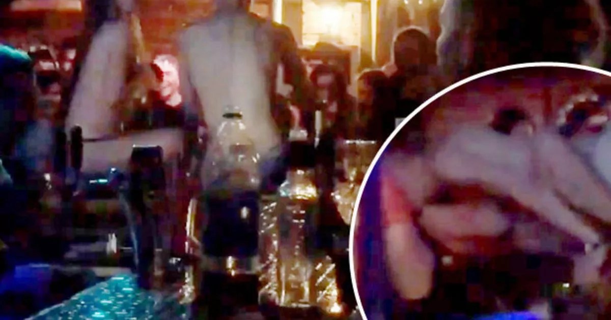 WATCH Randy couple simulate sex on packed bar as staff cheer