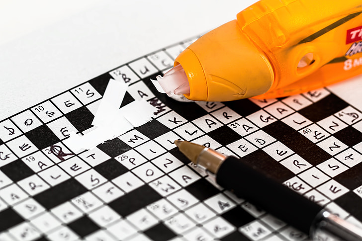 RoyaltyFree photo Black and white crossword puzzle with pen and