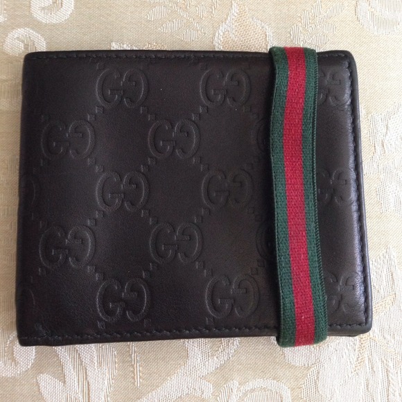 Gucci 💯Authentic Men's Gucci Wallet *PRICE IS FIRM* from Michelle's