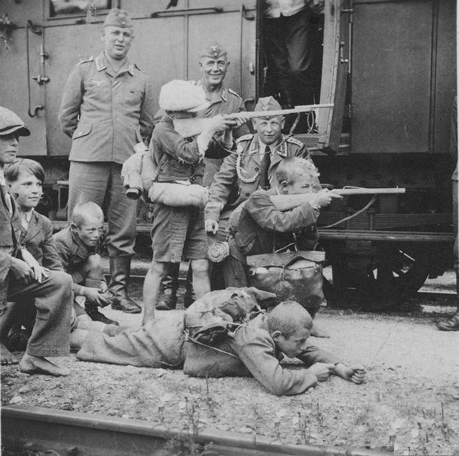 Germany World War II photography German soldiers foreign children