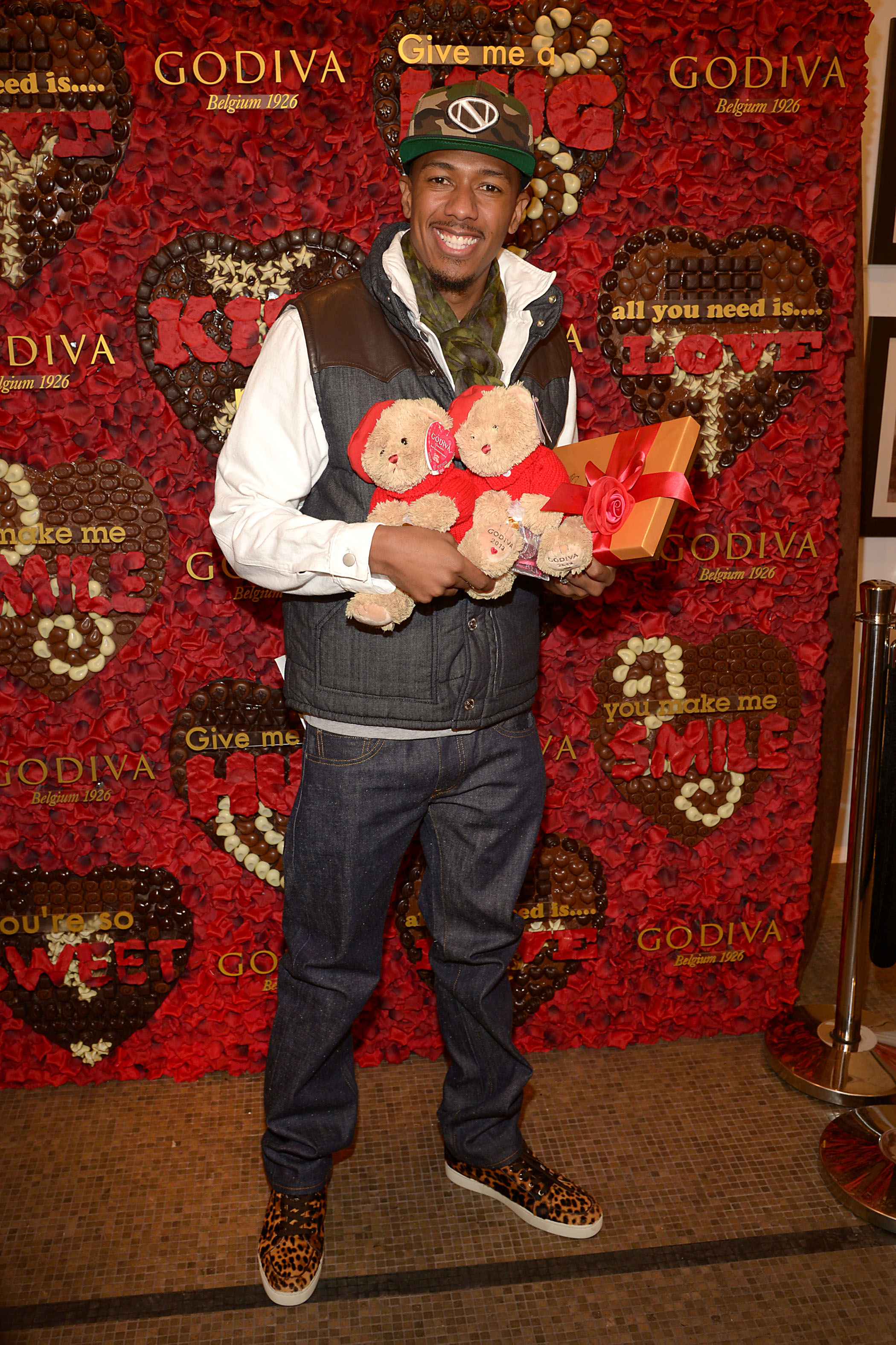 Katie Holmes & Nick Cannon Spotted at GODIVA Rockefeller