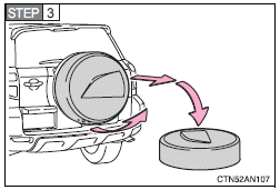 Toyota Rav4: Taking Out The Spare Tire (Vehicles With The Spare Tire Cover) - If You Have A Flat Tire (Vehicles With Standard Tires) - Essential Information - When Trouble Arises -