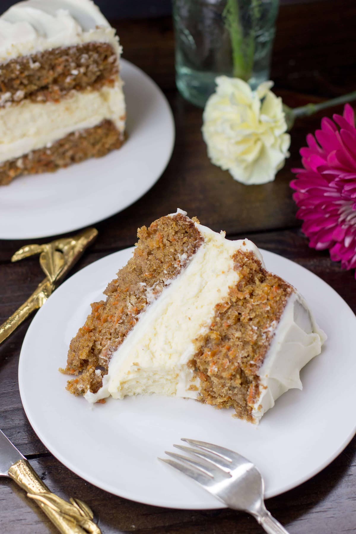 homemade carrot cake bites with spiced butter cream and a vanilla white chocolate shell. Cheesecake Layered Carrot Cake - Sugar Spun Run