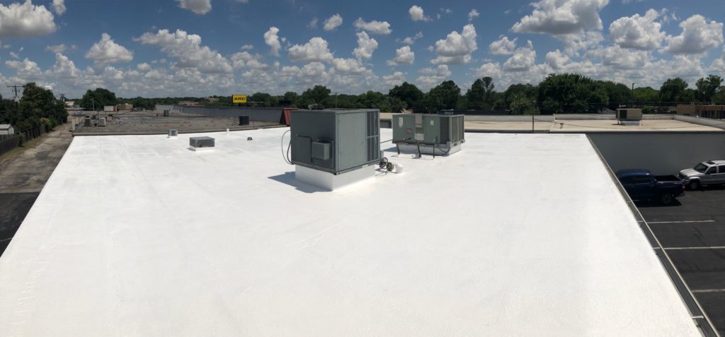 Roofers in Hurst, Texas for Silicone Coating on Modified Bitumen
