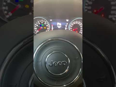 Come eseguire il reset della spia service della Jeep Compass (con video)