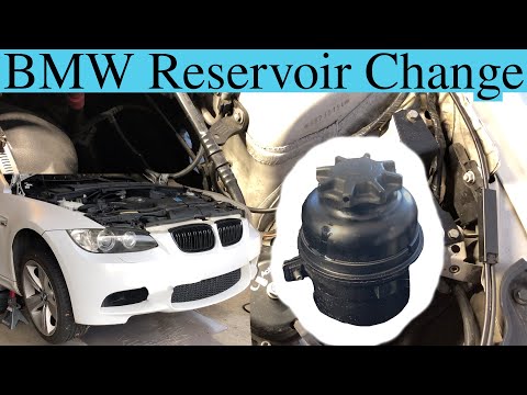 Where is the power steering fluid reservoir located in the BMW 3 Series