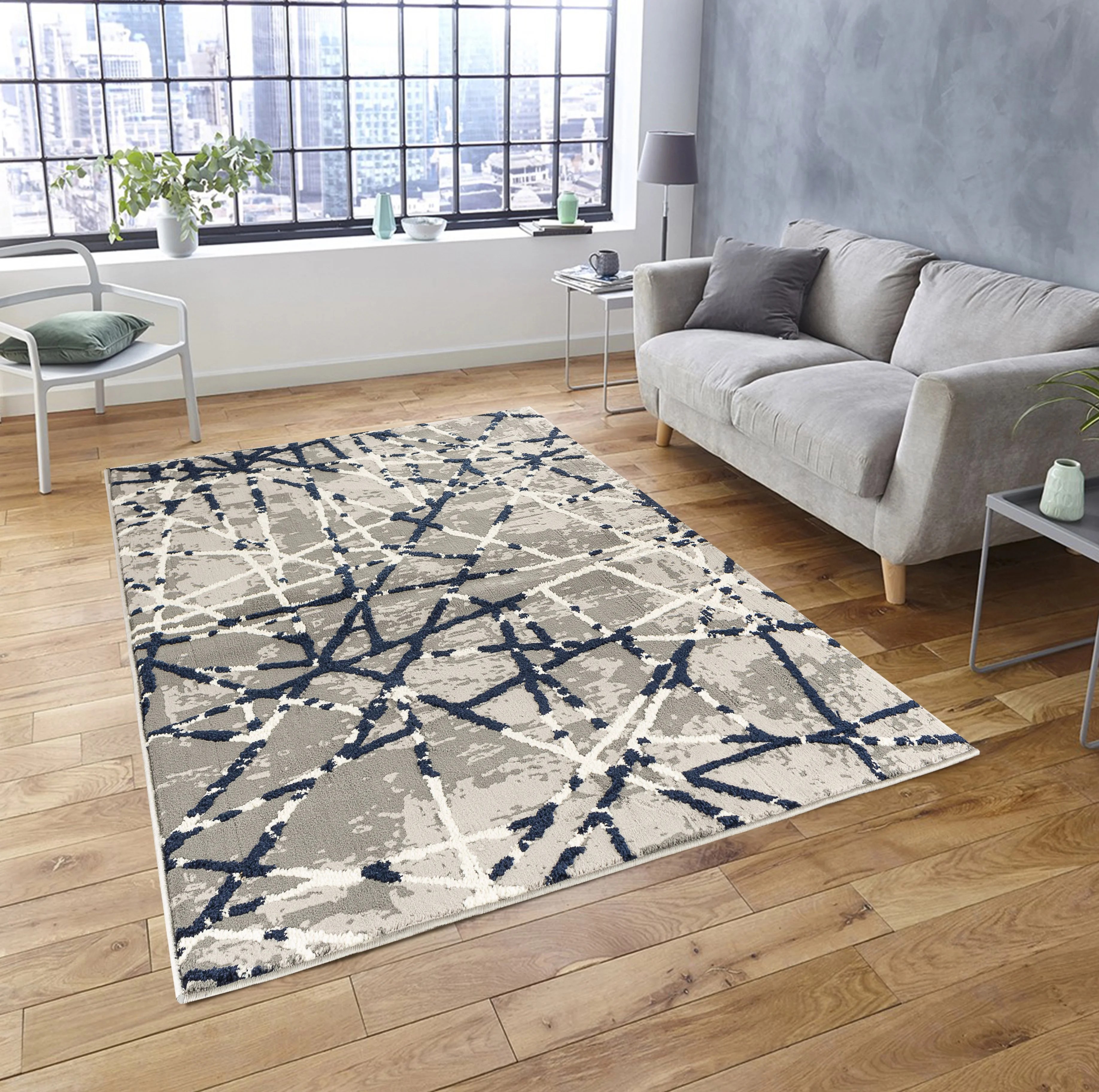 The Sofia Rugs Golden Shaggy Navy Blue, White, Gray Shag Area Rug