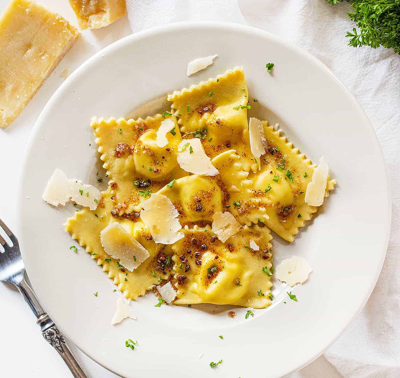 Homemade Five Cheese Ravioli With Garlic Brown Butter Sauce i am baker