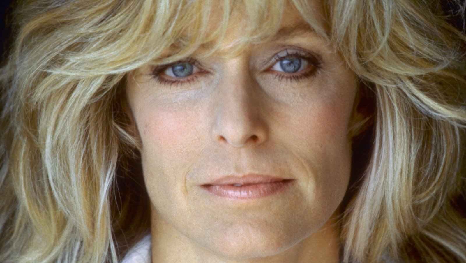 The Real Story Behind Farrah Fawcett's Iconic Red Swimsuit Poster