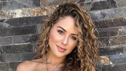 Octagon girl Brittney Palmer shows off underboob in tiny bikini as awestruck fans brand her