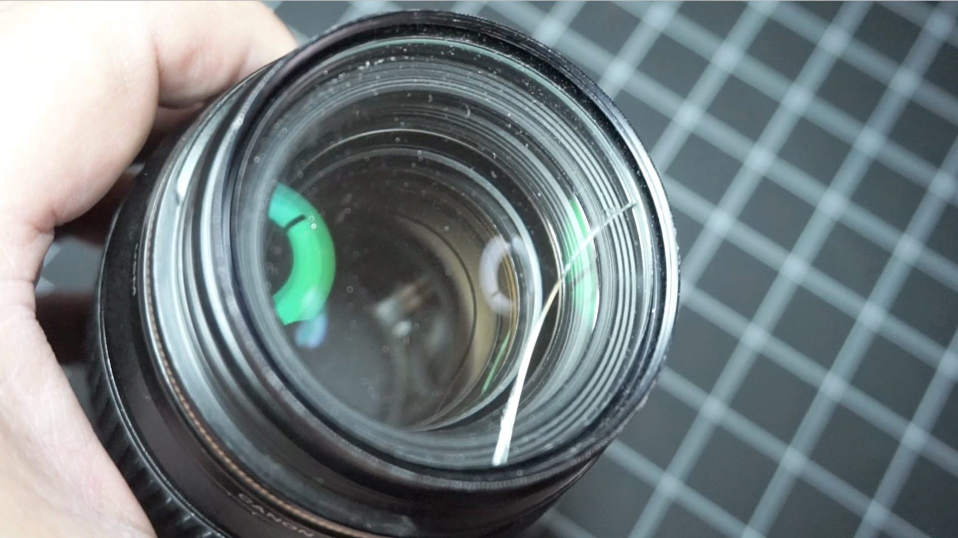 severely cracked lens filter on the front element of a lens has no