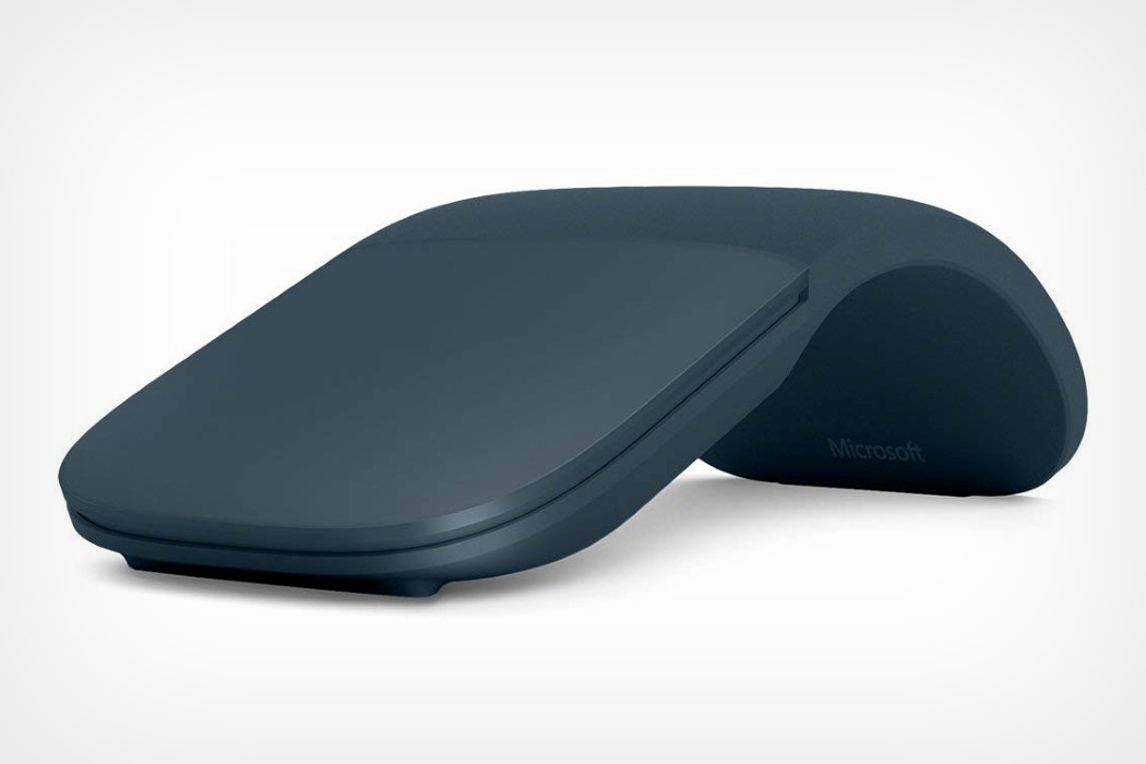 Flat computer mouse that slides away into your laptop IdeaMill