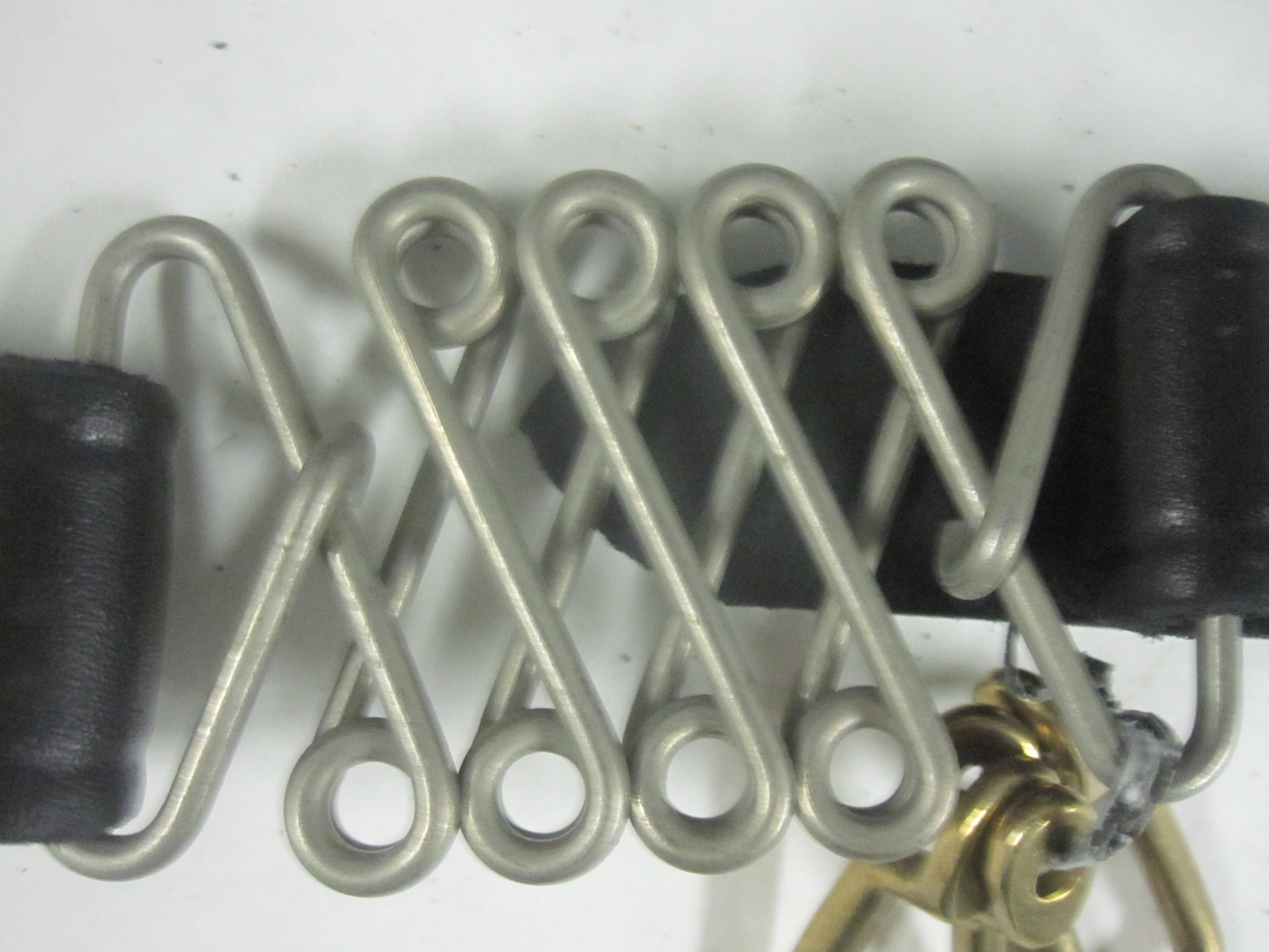 Ford Model T hood straps. 2937 Antiques Can you identify?