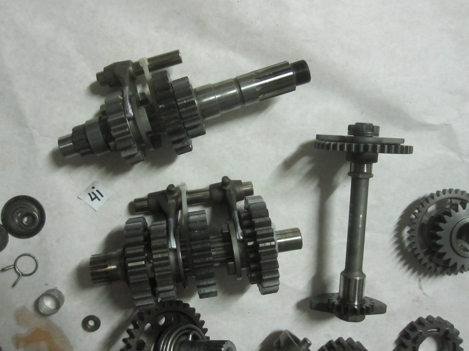 These are various parts for a 20042006 Honda CFR450R dirt bike. The