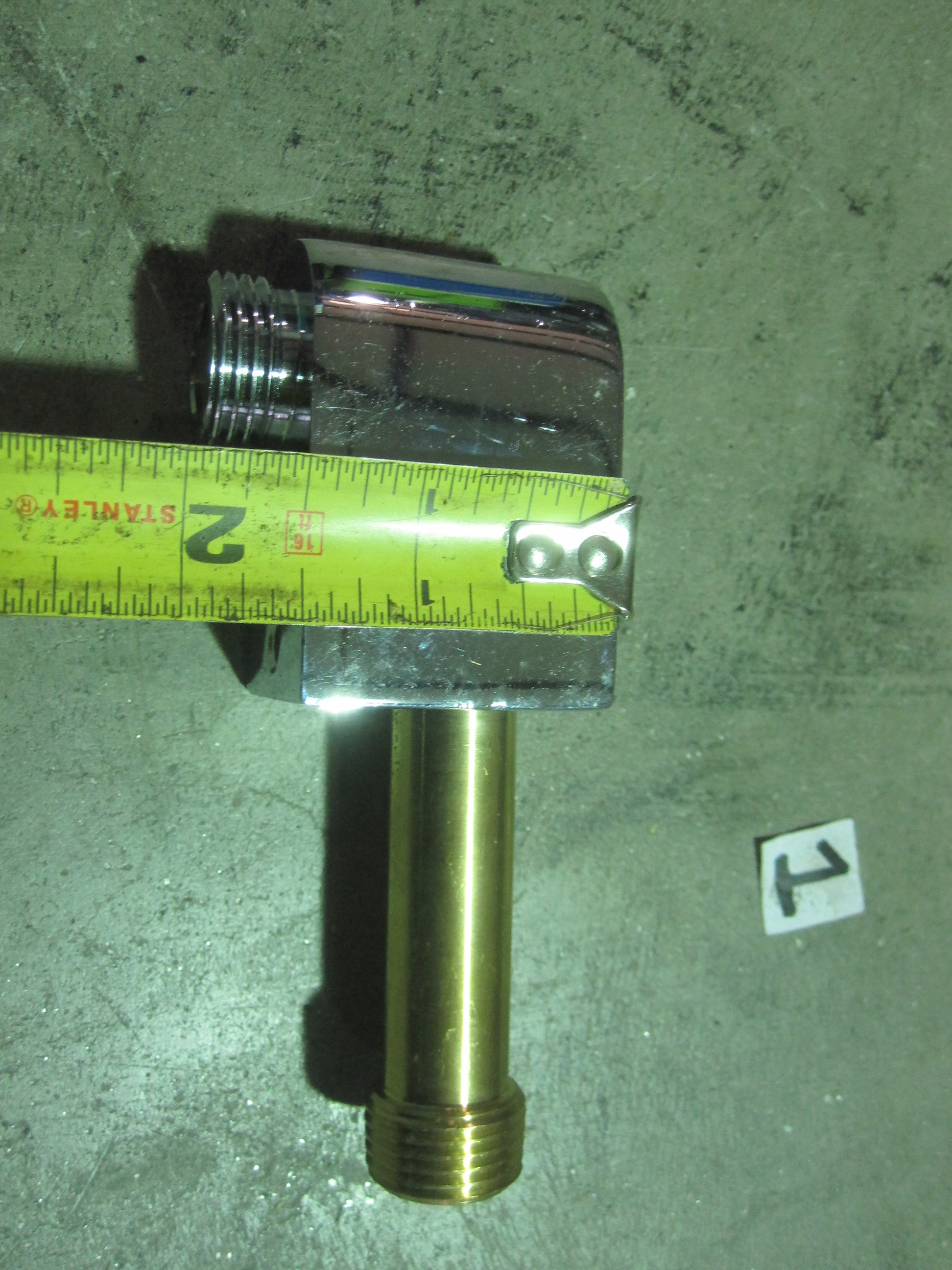 They're wall fittings for attaching a shower hose to the inwall water