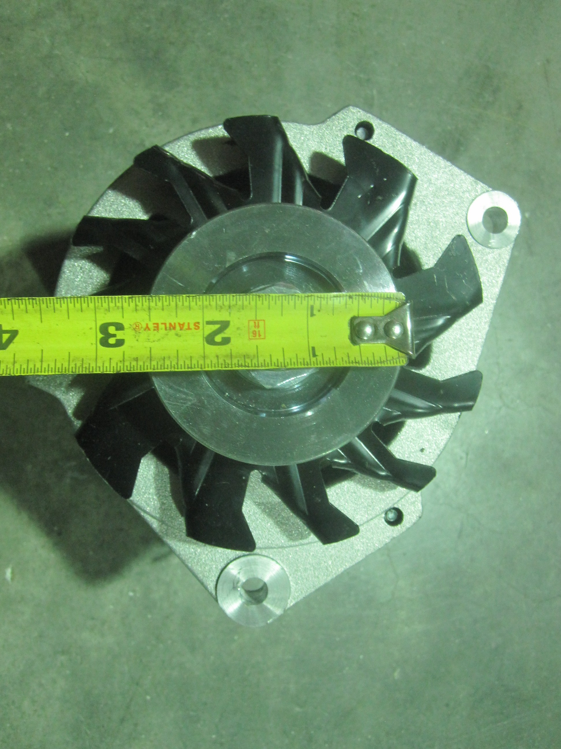 This is a Delco cs130 alternator conversion kit for MGs, Triumphs, and