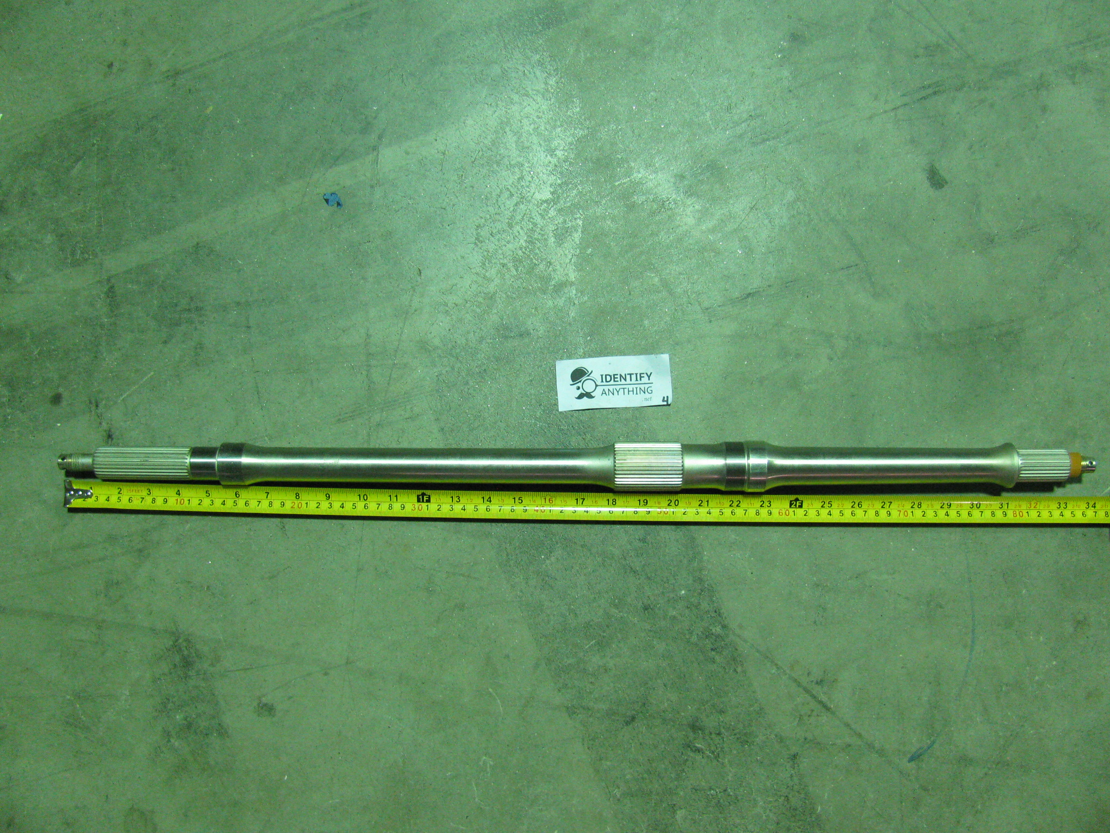 This is a rear axle for a Yamaha Kodiak 400 YFM400. This fits various