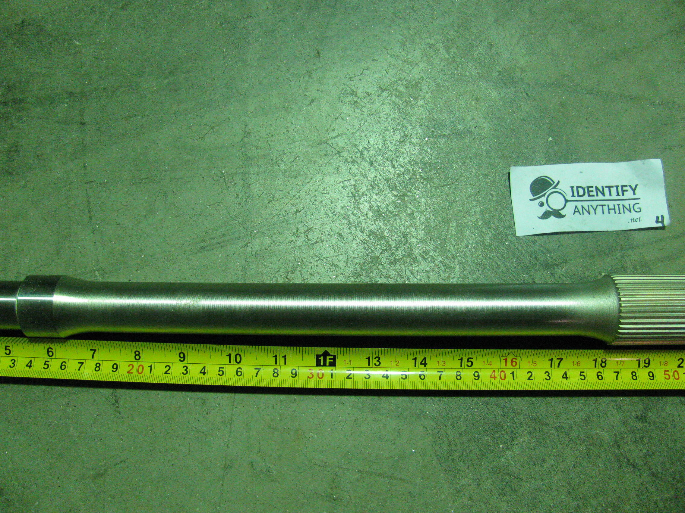 This is a rear axle for a Yamaha Kodiak 400 YFM400. This fits various