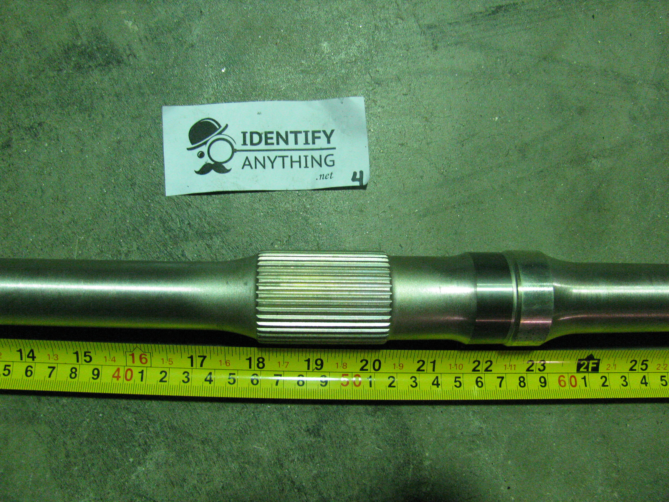 This is a rear axle for a Yamaha Kodiak 400 YFM400. This fits various