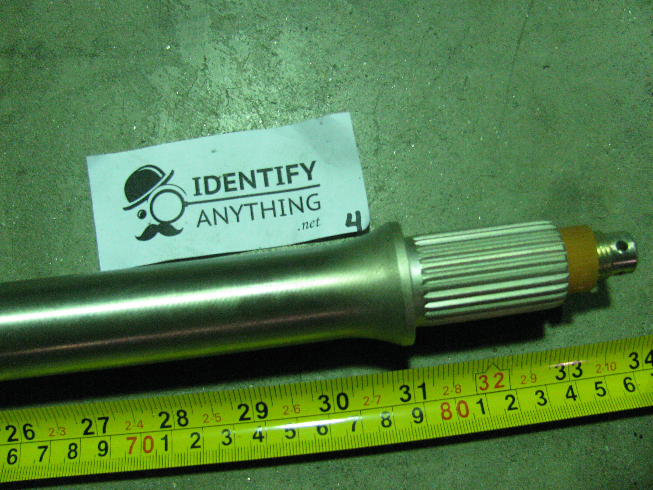 This is a rear axle for a Yamaha Kodiak 400 YFM400. This fits various 2000 thru 2002 models with