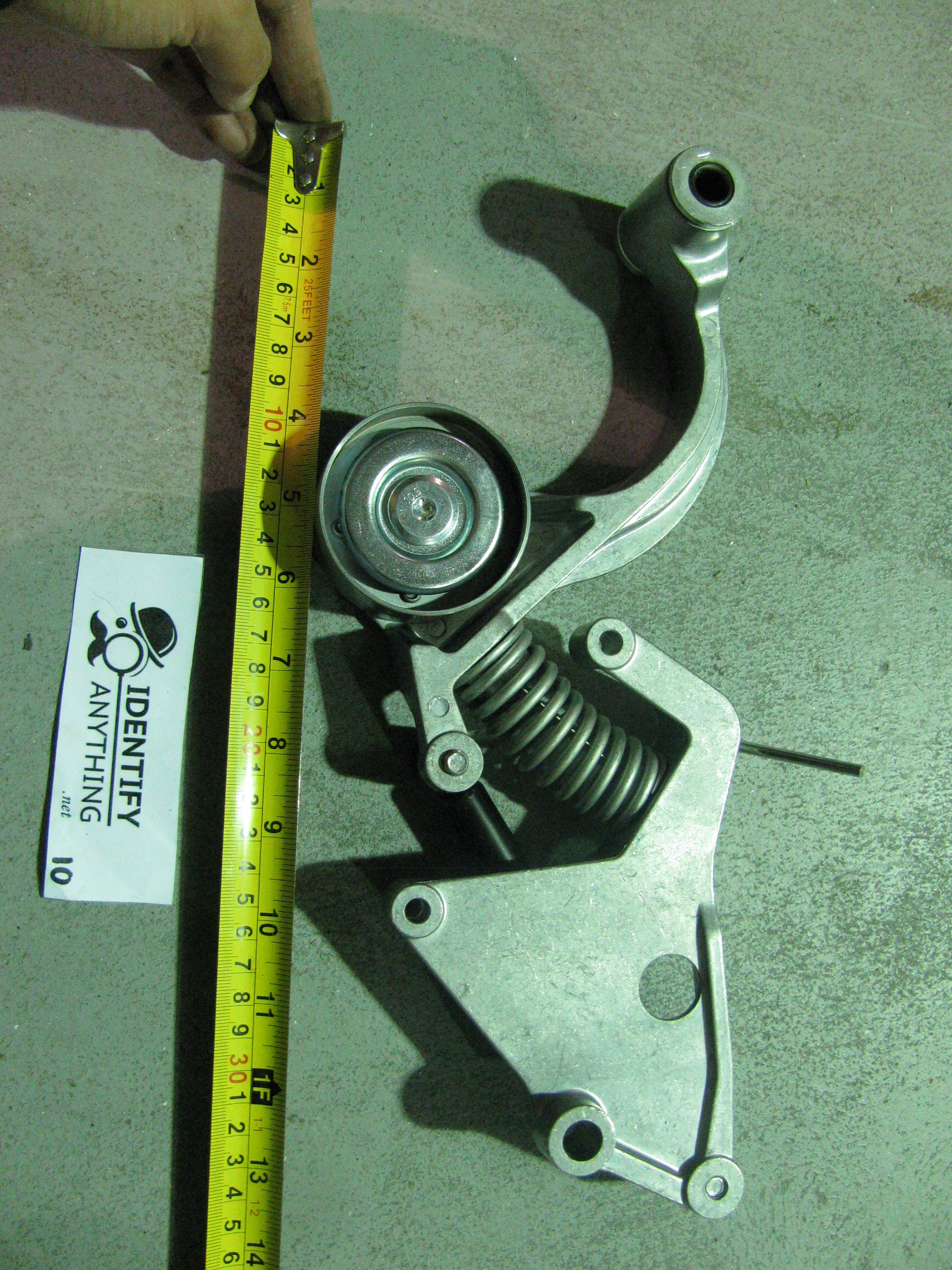 Serpentine belt tensioner for Mini Cooper 200207. Equivalent to