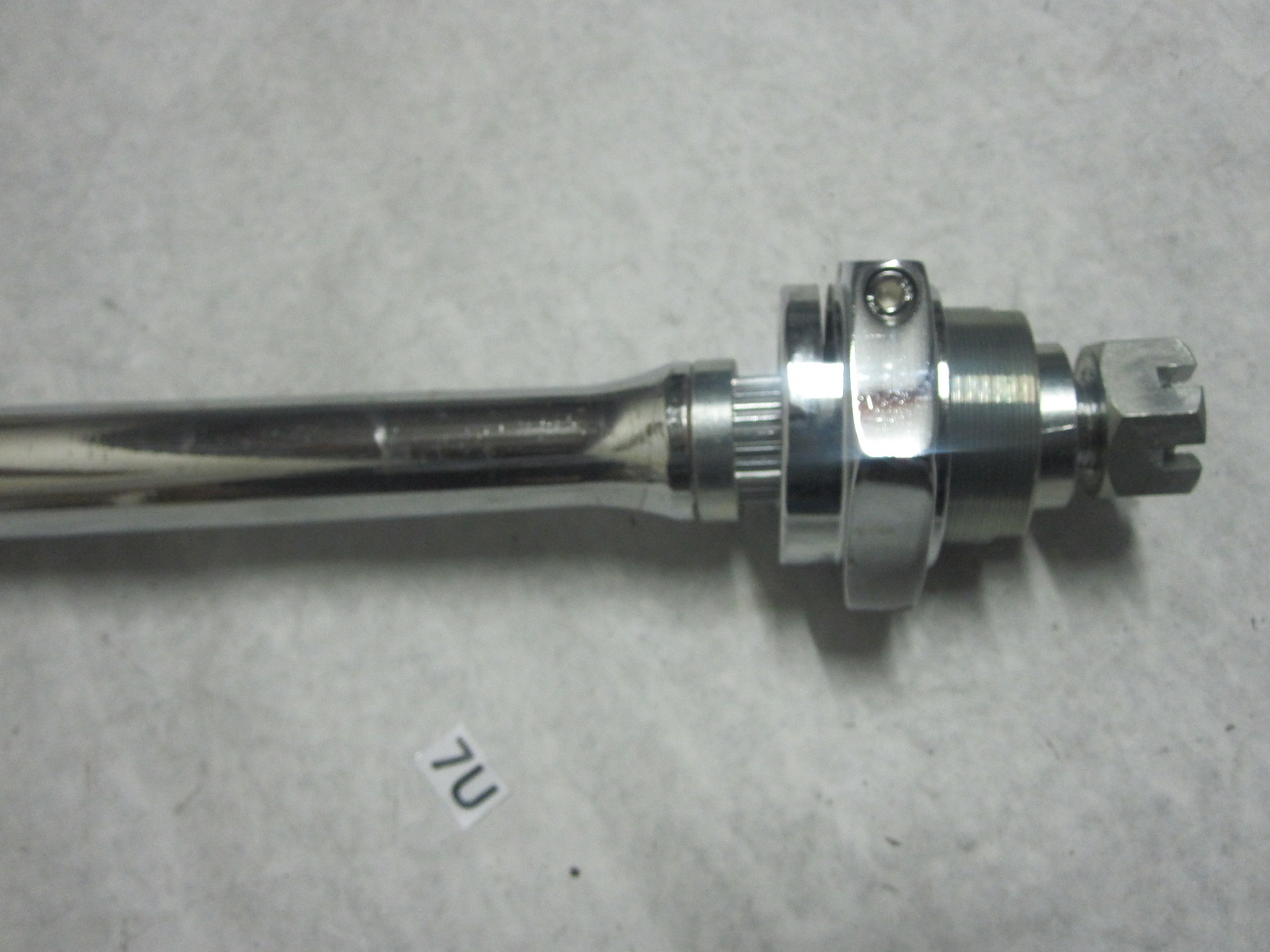 This is an adjustable rear axle for a Yamaha Raptor YFM700. This fits