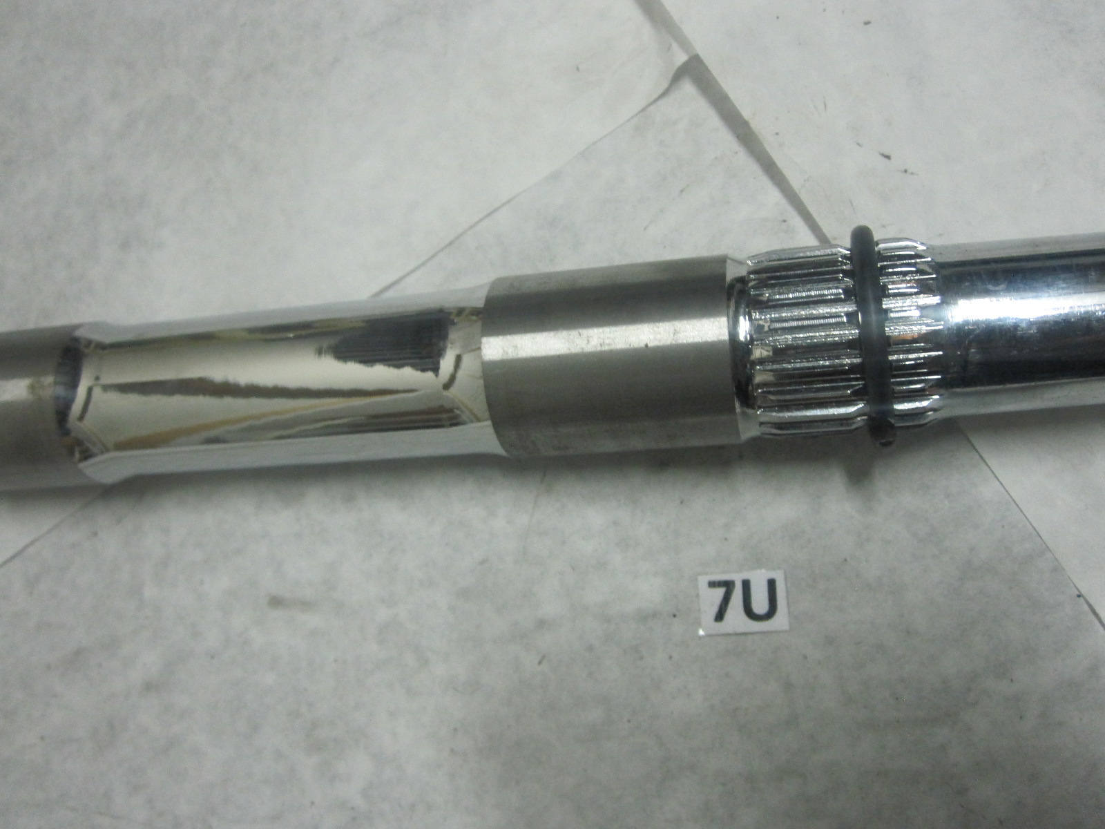 This is an adjustable rear axle for a Yamaha Raptor YFM700. This fits