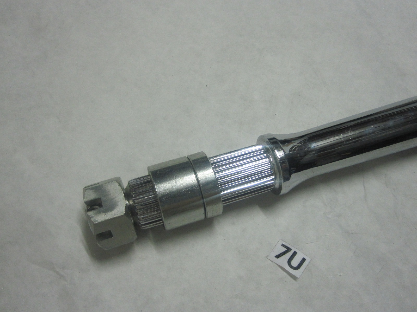 This is an adjustable rear axle for a Yamaha Raptor YFM700. This fits